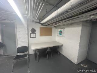 83-52 Talbot Street, Unit 3J Queens, NY 11415 - Photo 44 of 50 a view of a hallway with seating area