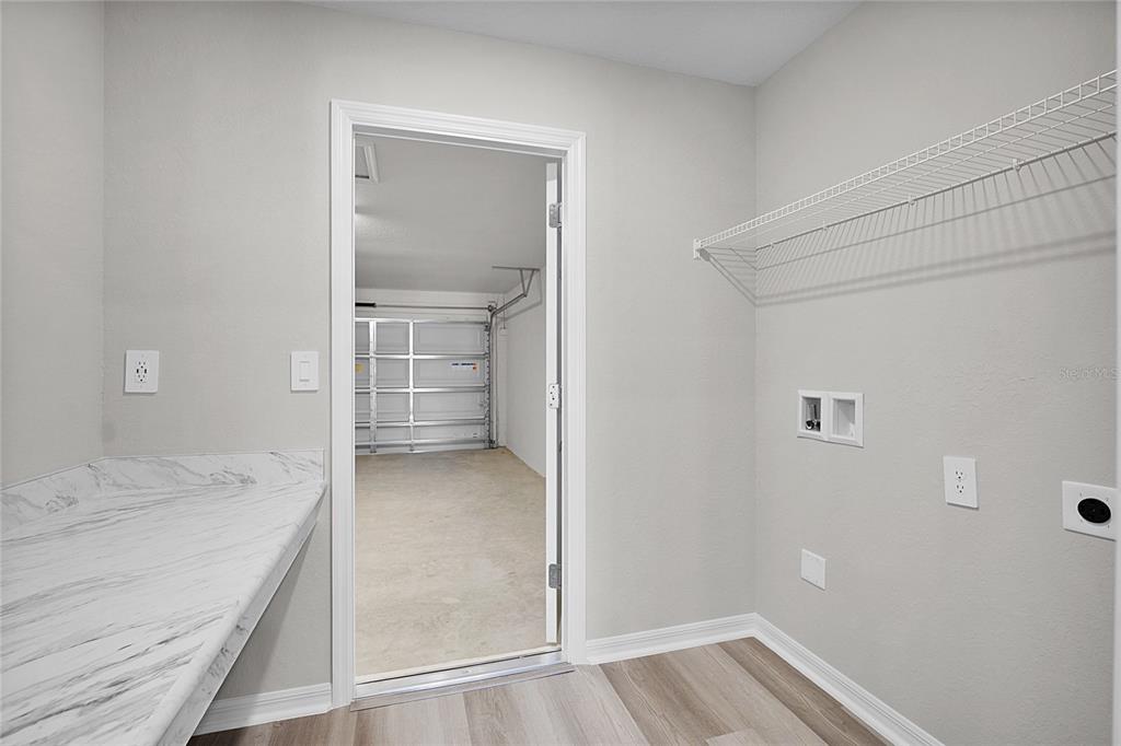 1617 Astrid Road Davenport, FL 33837 - Photo 24 of 43 a bathroom with a sink and a shower