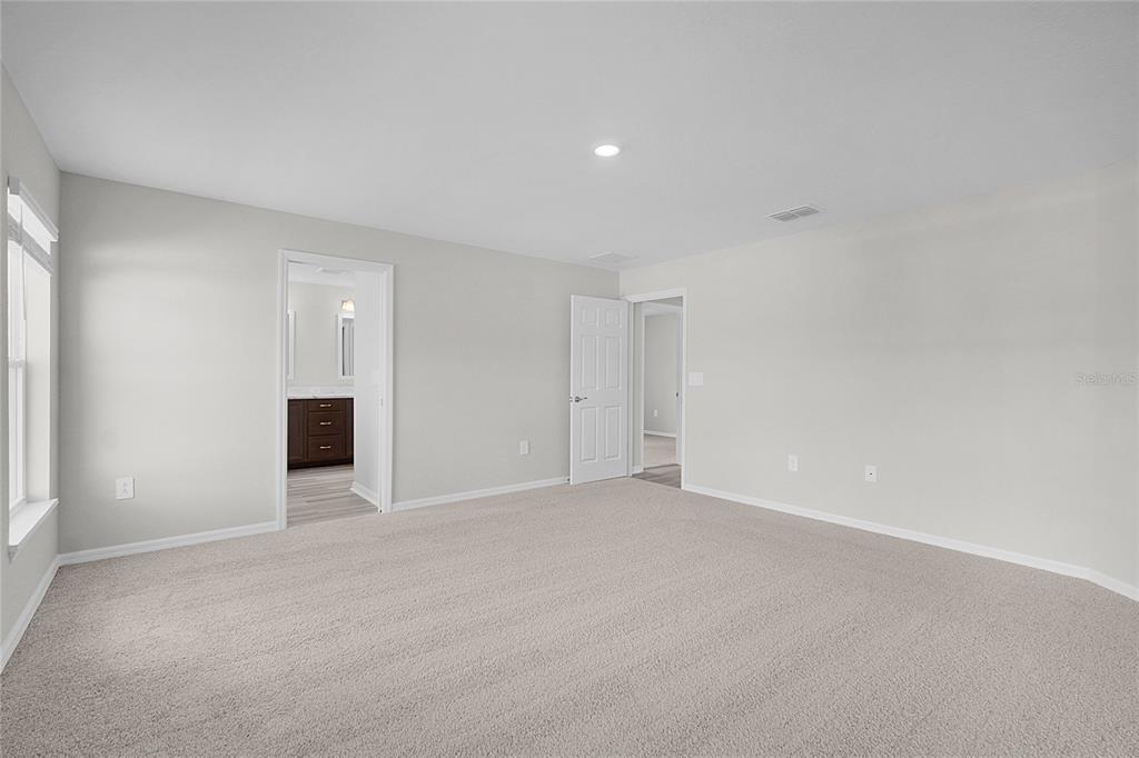 1617 Astrid Road Davenport, FL 33837 - Photo 30 of 43 a view of an empty room with a window