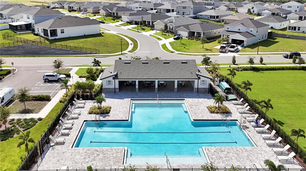 1617 Astrid Road Davenport, FL 33837 - Photo 40 of 43 an aerial view of a house with outdoor space swimming pool and outdoor seating