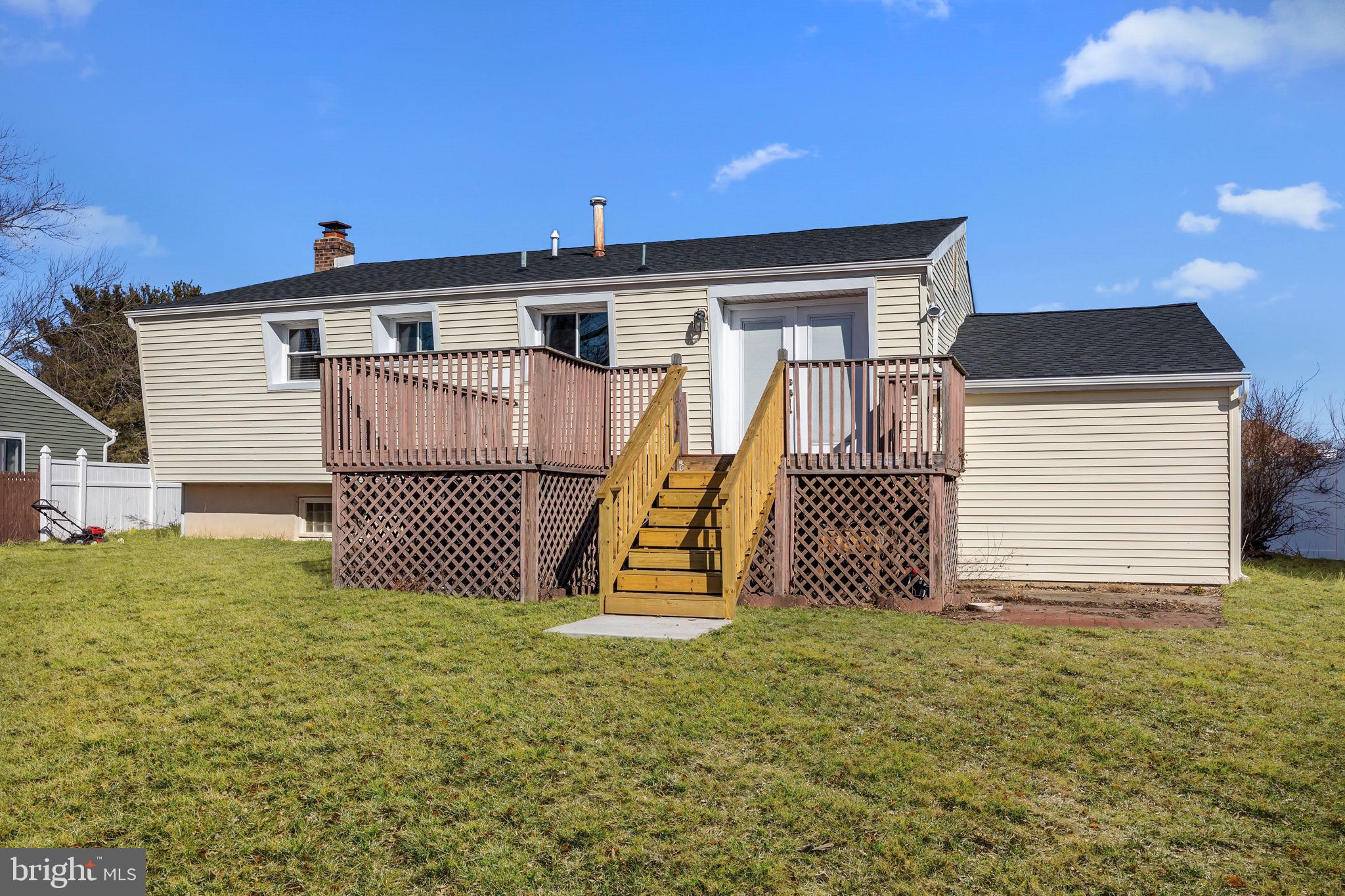 17 Capella Road Sewell, NJ 08080 - Photo 30 of 32 a front view of a house with a yard