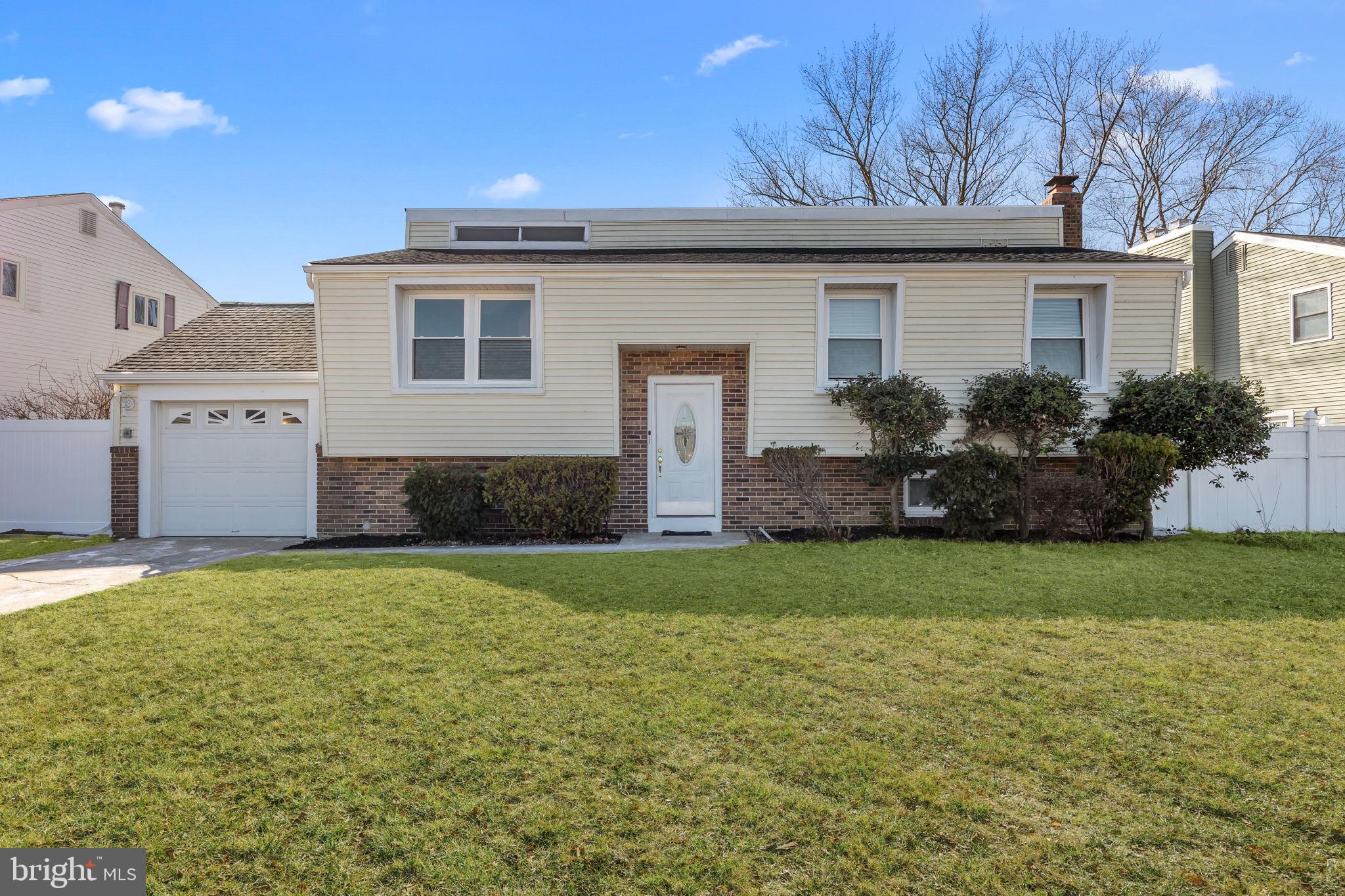 17 Capella Road Sewell, NJ 08080 - Photo 3 of 32 a front view of a house with a garden