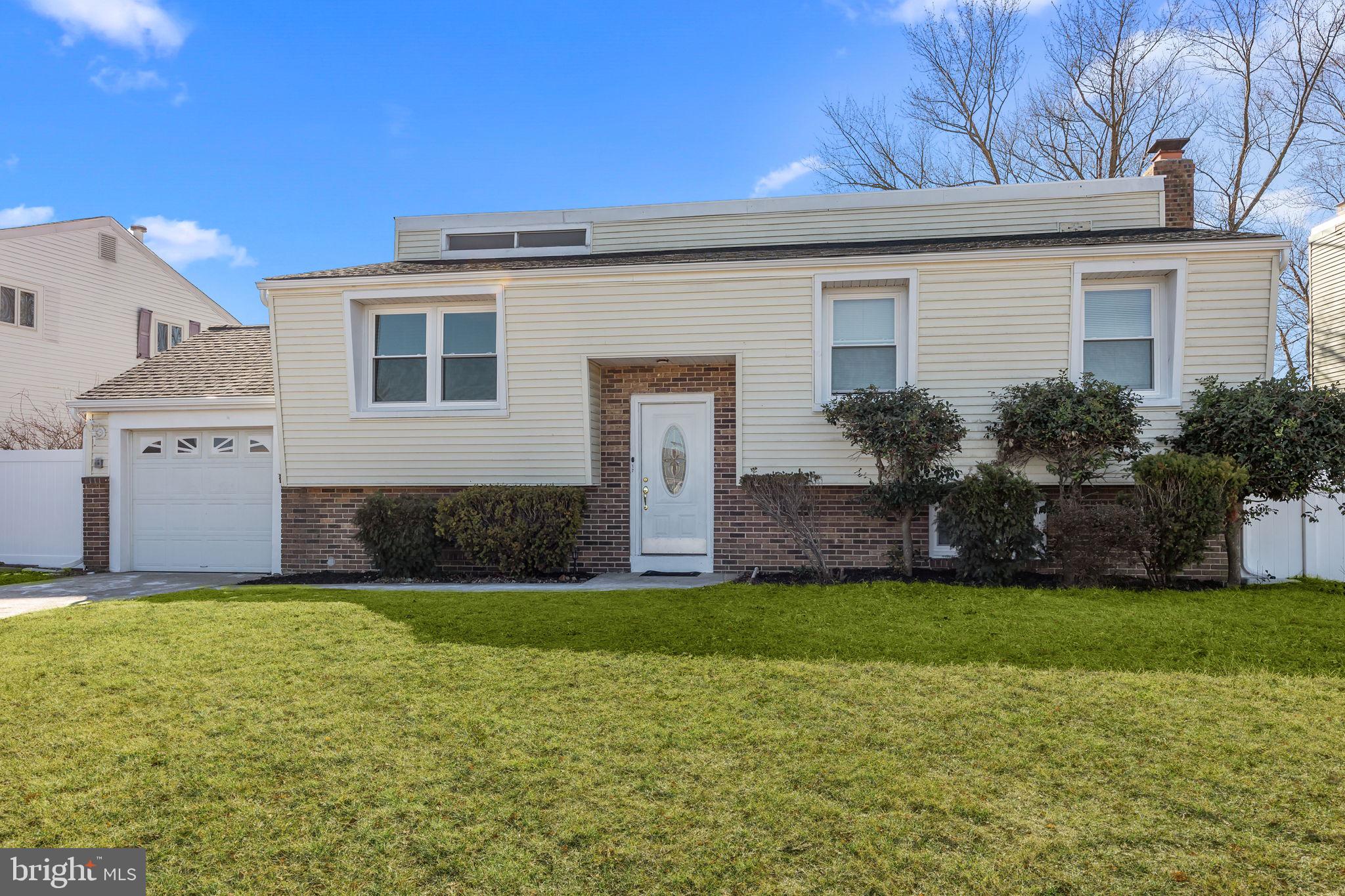 17 Capella Road Sewell, NJ 08080 - Photo 4 of 32 a view of a house with a yard and a large tree
