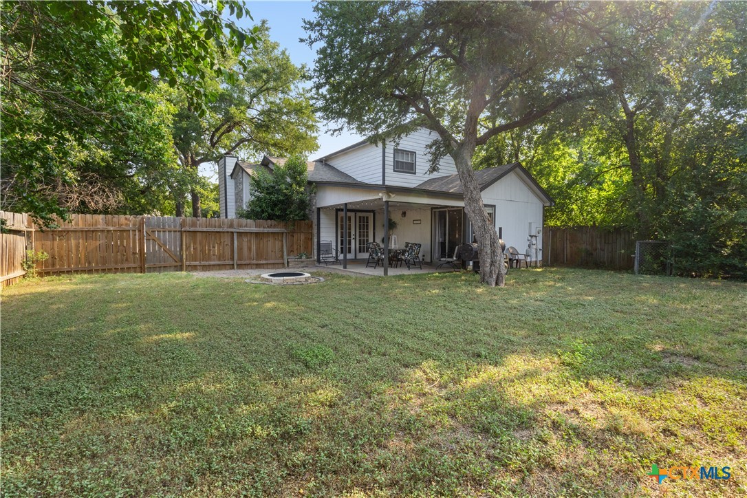 2107 Raintree Path Round Rock, TX 78664 - Photo 30 of 35 a front view of a house with garden