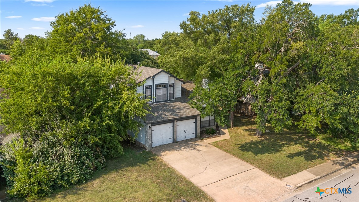 2107 Raintree Path Round Rock, TX 78664 - Photo 4 of 35 a view of a house with a backyard