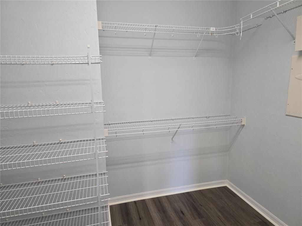 7976 48 Way Gainesville, FL 32653 - Photo 12 of 26 a view of a room with racks on the wall