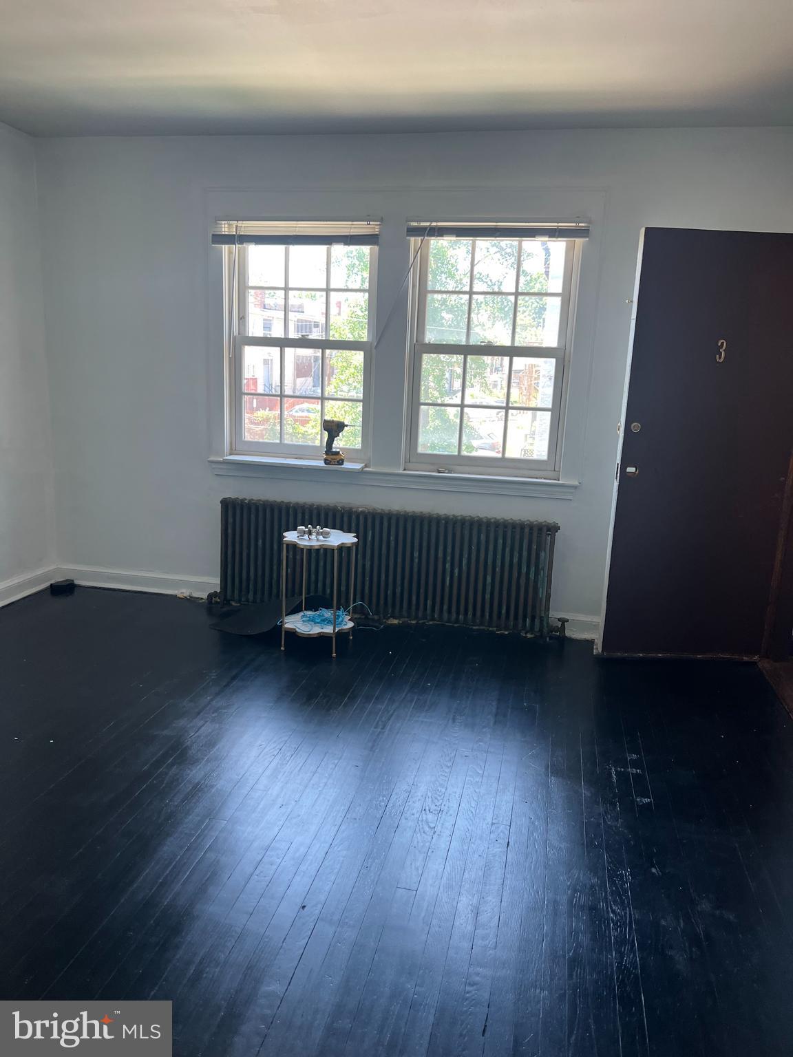 1601 Holbrook Street Northeast Washington, DC 20002 - Photo 14 of 21 a view of a room with wooden floor and furniture