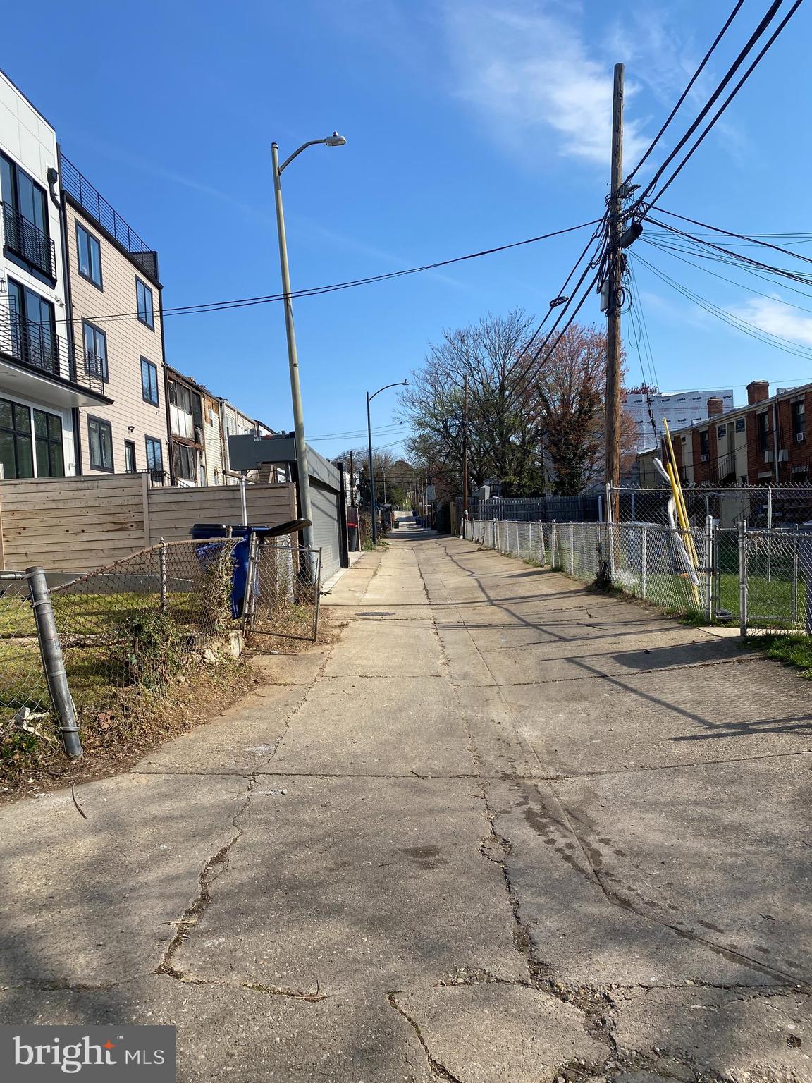 1601 Holbrook Street Northeast Washington, DC 20002 - Photo 3 of 21 a backyard of a house with table and chairs