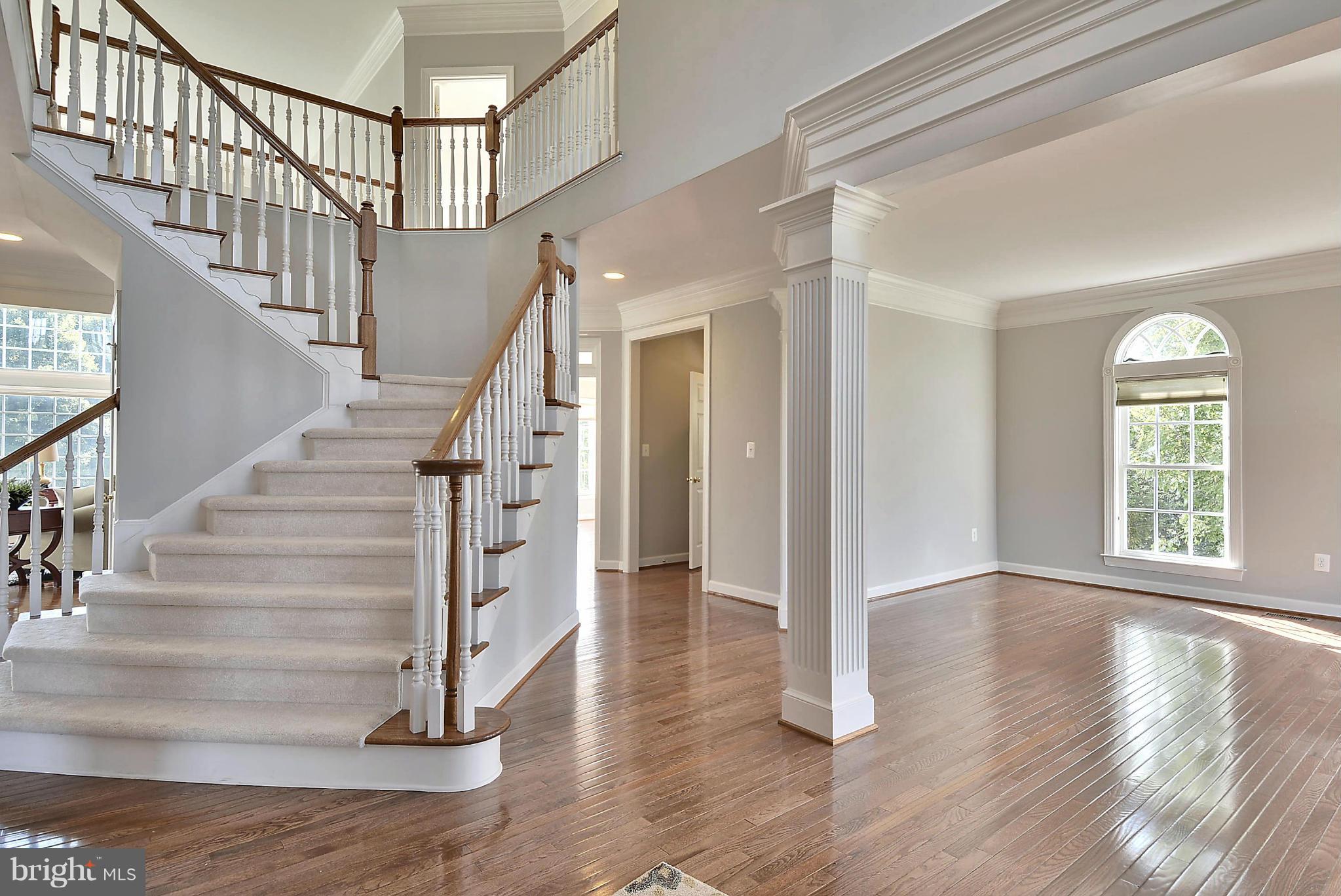 15429 Maple Ridge Drive Woodbine, MD 21797 - Photo 3 of 30 a view of entryway with wooden floor and stairs