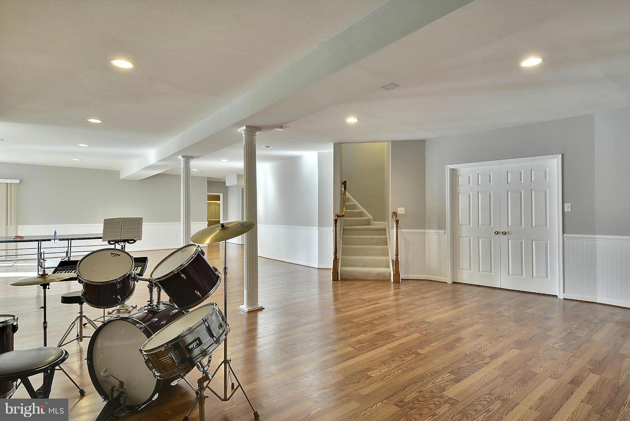 15429 Maple Ridge Drive Woodbine, MD 21797 - Photo 22 of 30 a view of a room with wooden floor furniture and windows