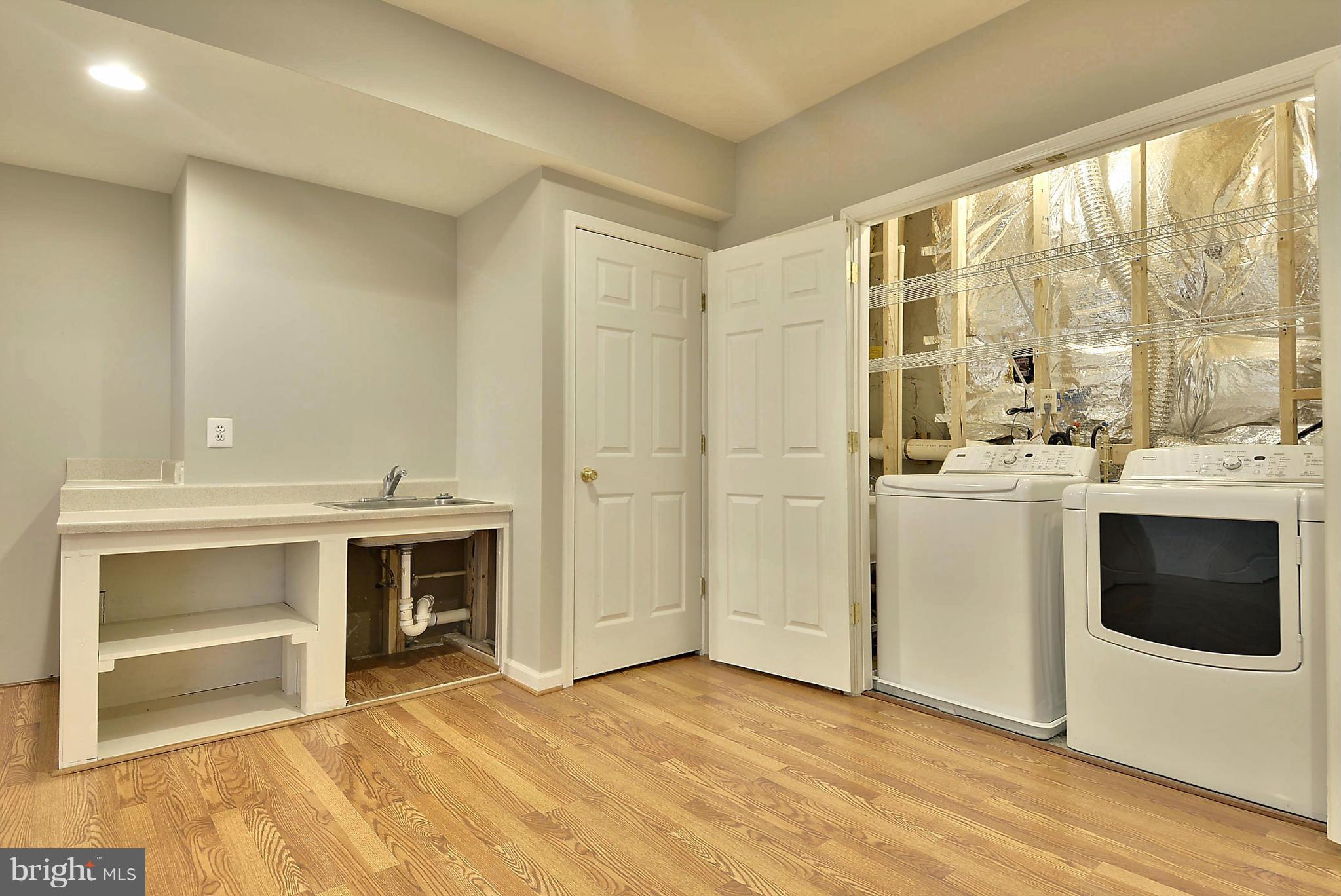 15429 Maple Ridge Drive Woodbine, MD 21797 - Photo 25 of 30 a view of washer and dryer in a room