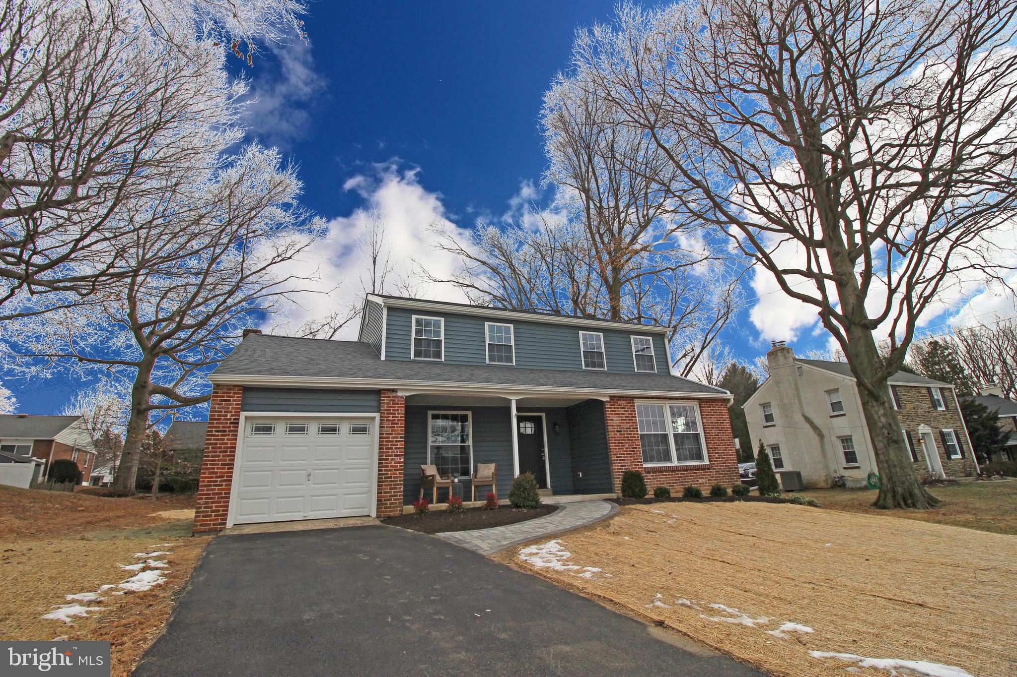 949 West Avenue Springfield, PA 19064 - Photo 1 of 42 a front view of a house with yard