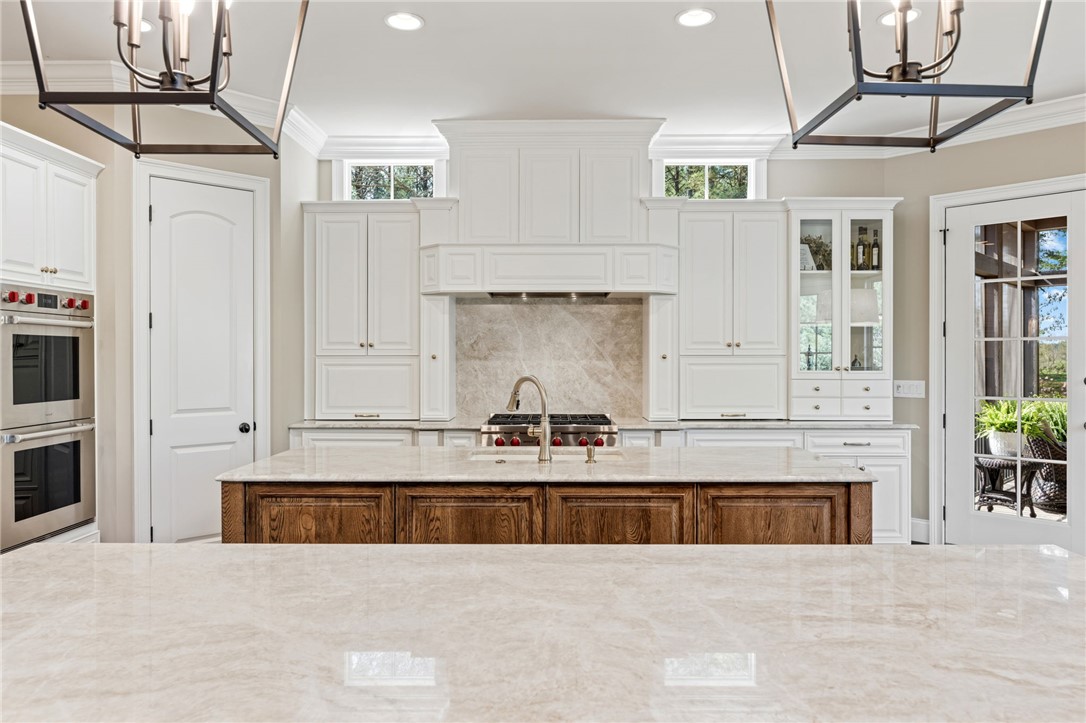 418 Augusta Way Sunset, SC 29685 - Photo 10 of 50 This chef-inspired kitchen combines elegant design with professional-grade appliances for effortless entertaining.