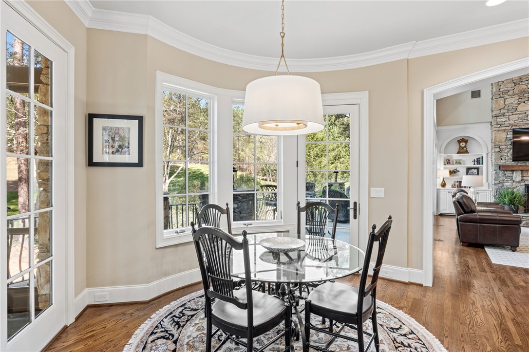 418 Augusta Way Sunset, SC 29685 - Photo 11 of 50 This bright breakfast area offers elegant dining and tranquil outdoor views.