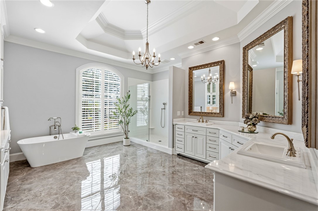 418 Augusta Way Sunset, SC 29685 - Photo 13 of 50 This spacious bathroom offers a serene retreat with elegant fixtures and finishes.