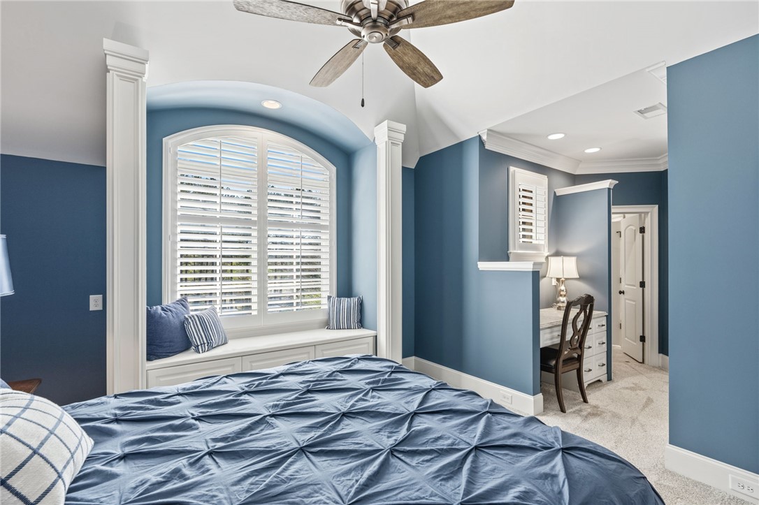 418 Augusta Way Sunset, SC 29685 - Photo 22 of 50 This inviting bedroom features a cozy window seat and ample natural light, perfect for relaxation.