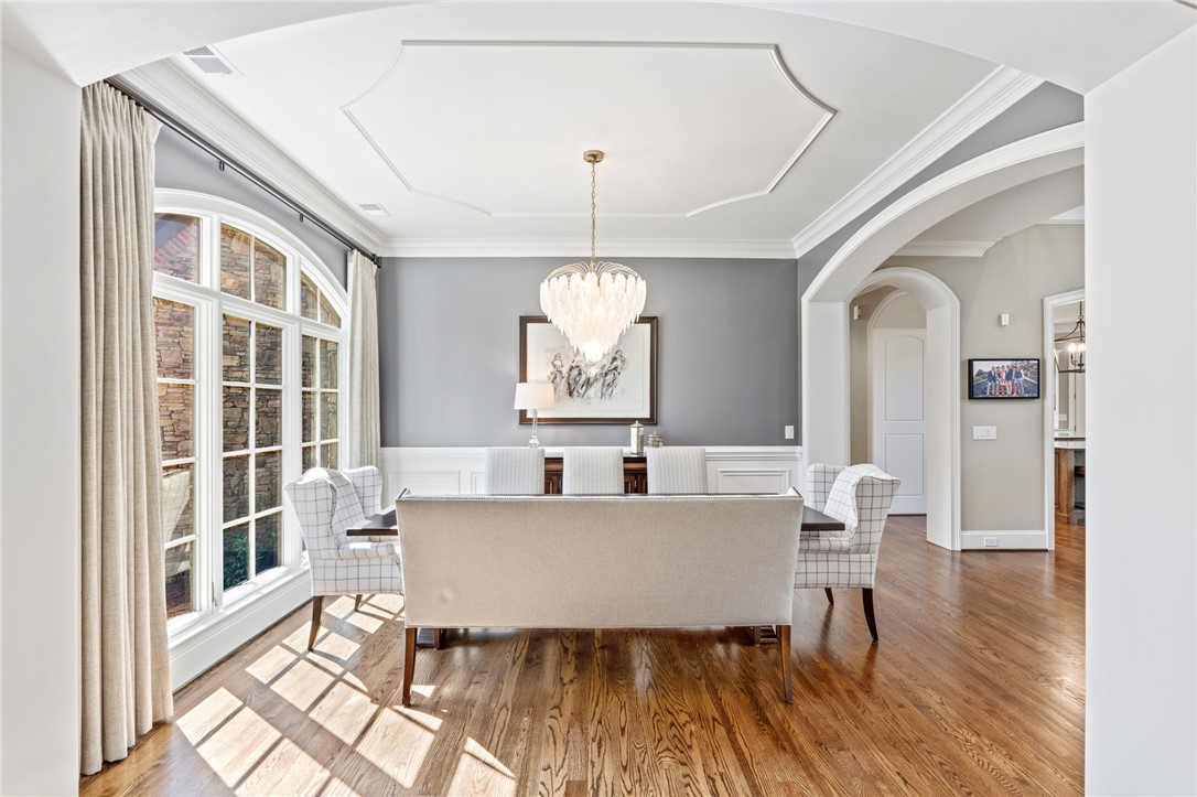 418 Augusta Way Sunset, SC 29685 - Photo 3 of 50 This elegant dining room features architectural details, rich hardwood flooring and decorative molding.