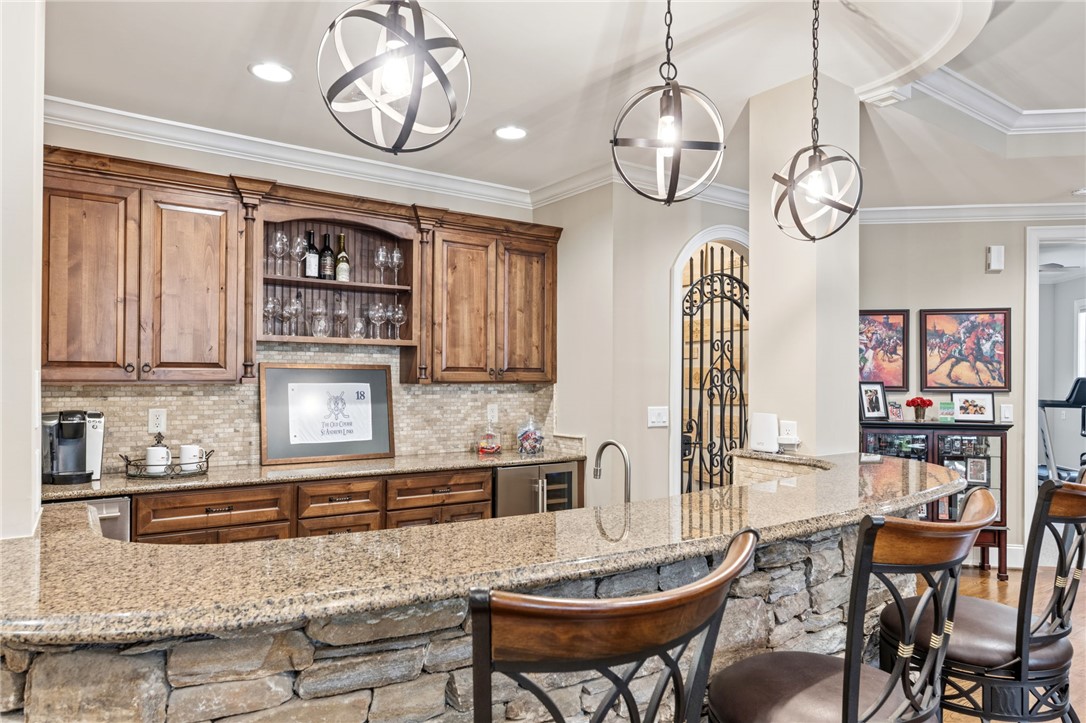 418 Augusta Way Sunset, SC 29685 - Photo 30 of 50 This exquisite home offers an elegant bar area, perfect for entertaining guests.