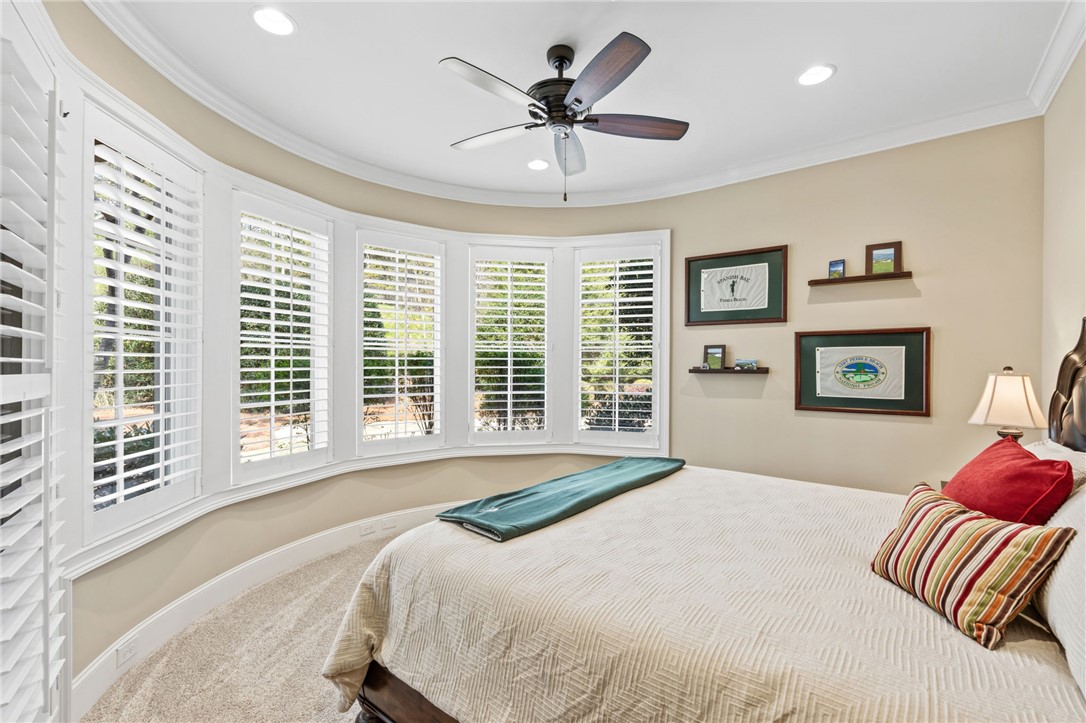 418 Augusta Way Sunset, SC 29685 - Photo 34 of 50 This bedroom offers a tranquil retreat with soft carpet and elegant window treatments.