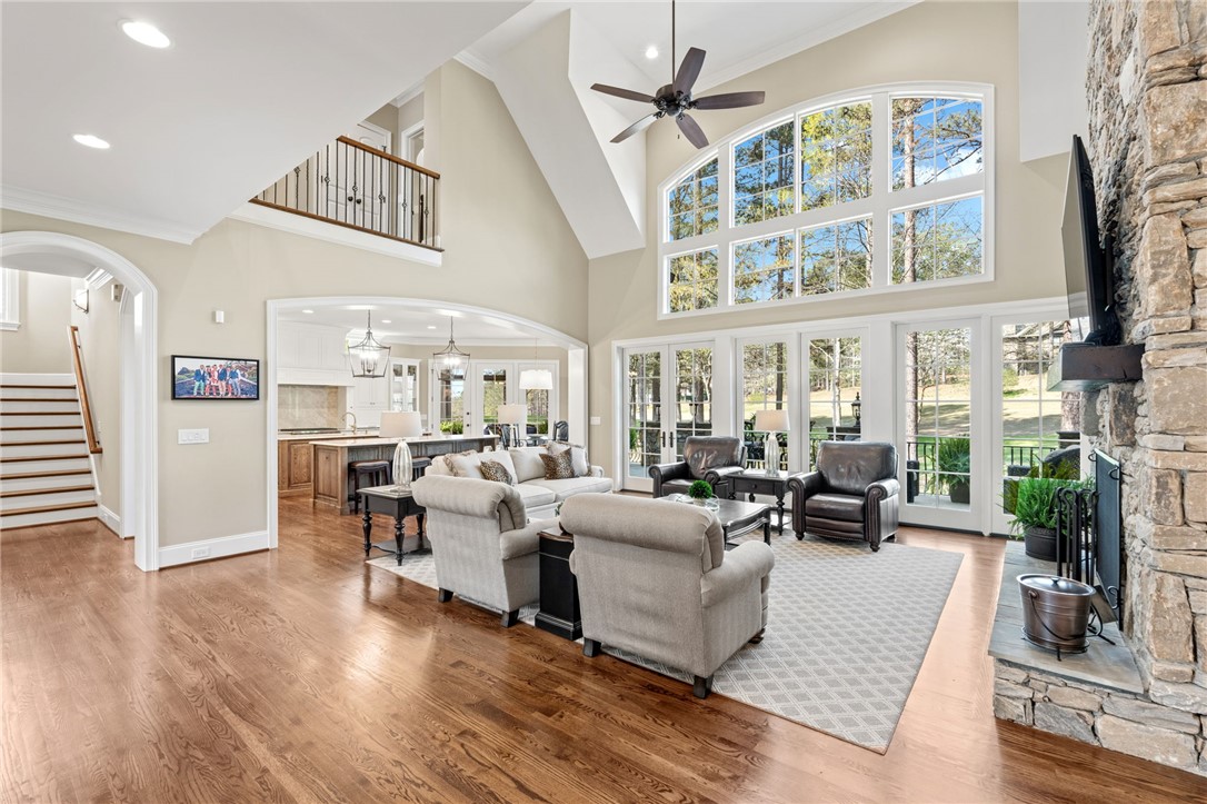 418 Augusta Way Sunset, SC 29685 - Photo 6 of 50 This airy living space features soaring ceilings, a stone fireplace, and abundant natural light.