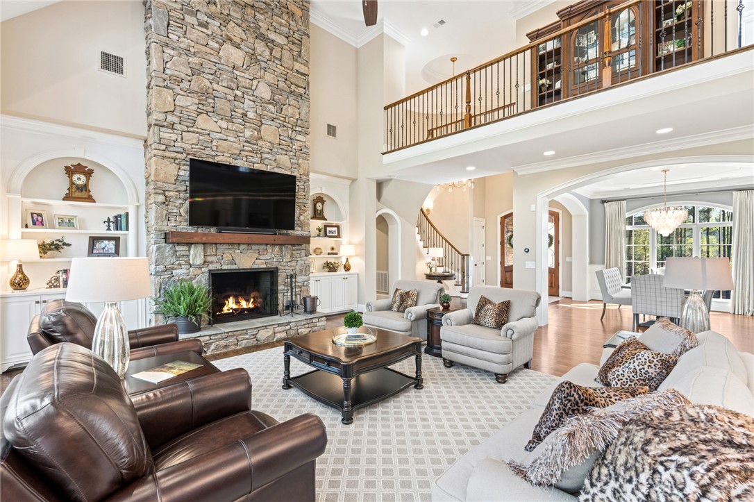418 Augusta Way Sunset, SC 29685 - Photo 50 of 50 Soaring stone fireplace, high ceilings, and an elegant open floorplan.