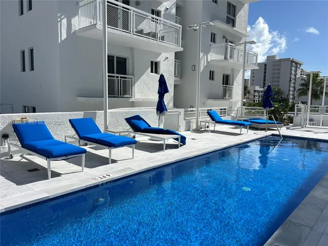 a view of kitchen with dining table and chairs