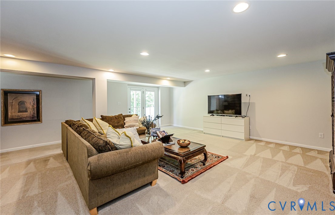 7435 Wicks Road Williamsburg, VA 23188 - Photo 64 of 82 Spacious lower-level room featuring neutral carpe