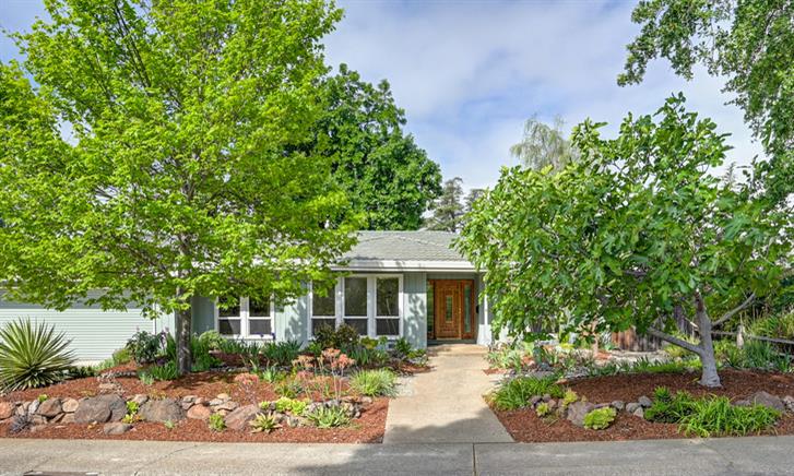 3947 Milmar Way Sacramento, CA 95821 - Photo 1 of 1 front view of a house with a garden