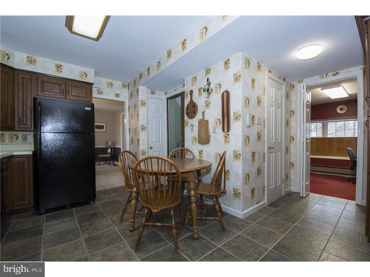 17 Braeburn Road Havertown, PA 19083 - Photo 11 of 25 a kitchen with stainless steel appliances kitchen island granite countertop a refrigerator and a sink