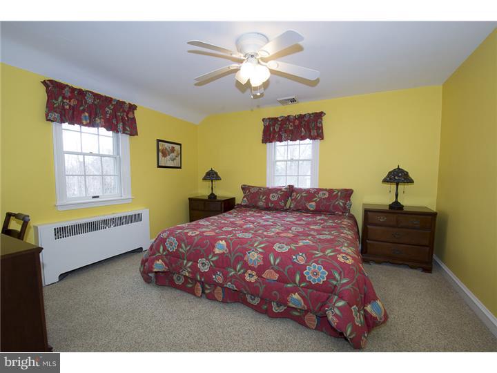 17 Braeburn Road Havertown, PA 19083 - Photo 17 of 25 a bedroom with a bed window and dresser
