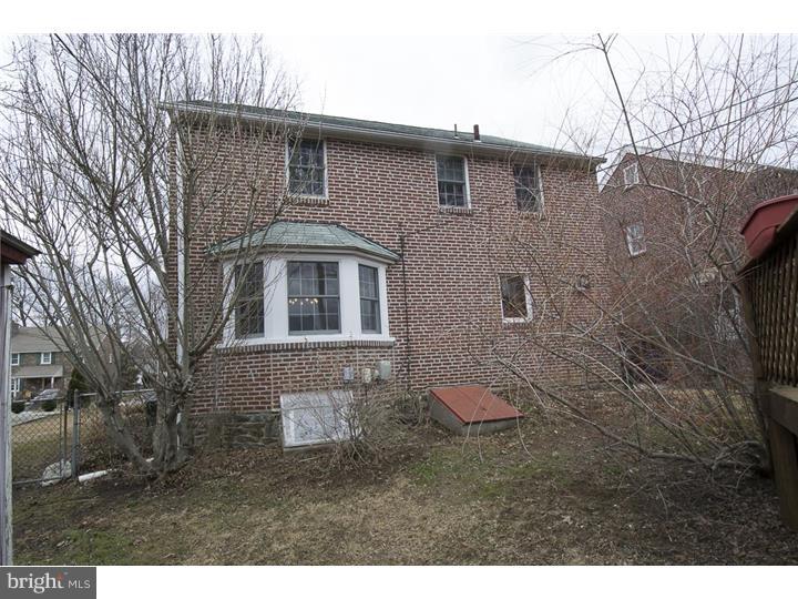 17 Braeburn Road Havertown, PA 19083 - Photo 22 of 25 a front view of a house with a yard