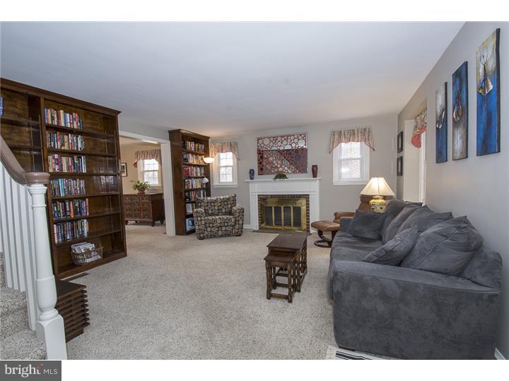 17 Braeburn Road Havertown, PA 19083 - Photo 4 of 25 a living room with furniture and a fireplace