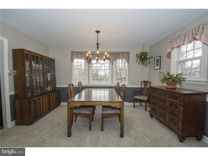 17 Braeburn Road Havertown, PA 19083 - Photo 7 of 25 a dining room with furniture a chandelier and window