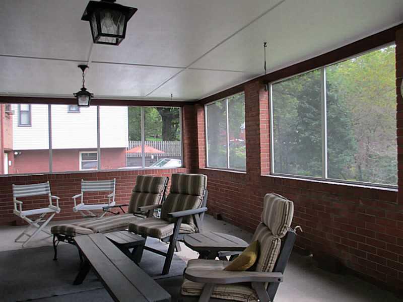 313 Edgewood Road Forest Hills, PA 15221 - Photo 12 of 18 Exterior Front. Large screened in porch