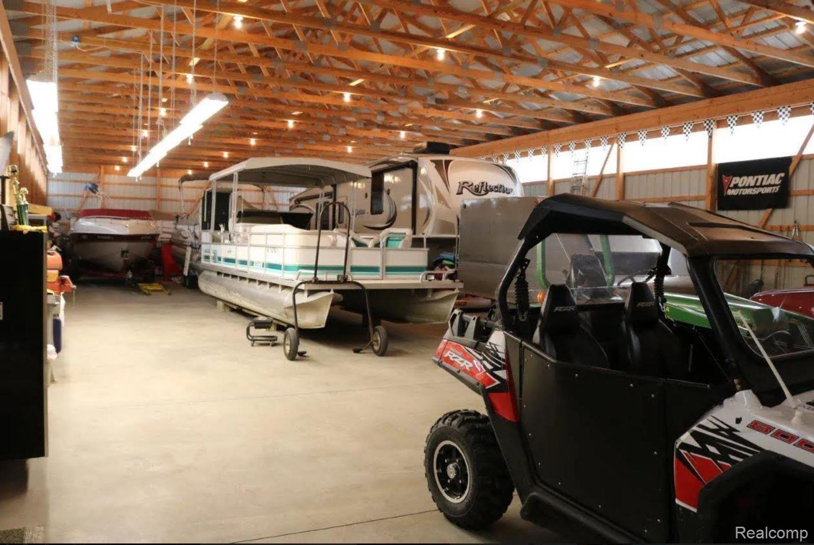 6595 Little Canada Road Cheboygan, MI 49721 - Photo 11 of 12 View of garage
