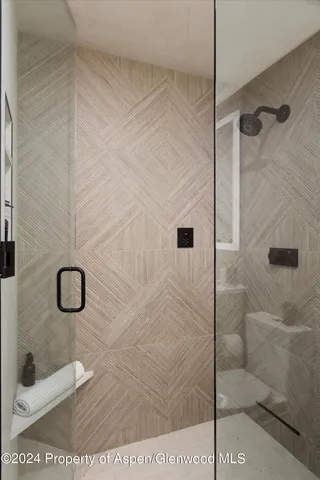 a view of a balcony with chairs