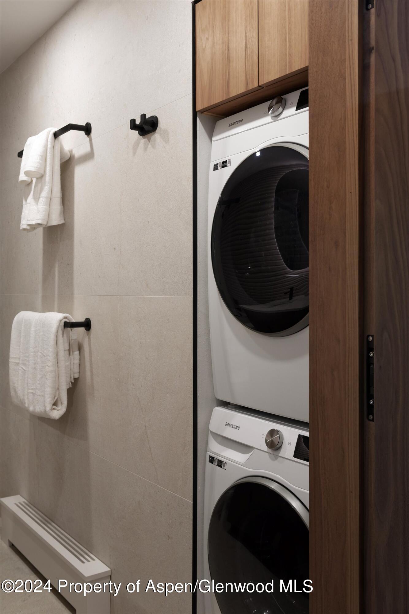 205 East Durant Avenue, Unit 1I Aspen, CO 81611 - Photo 30 of 45 a utility room with dryer and washer