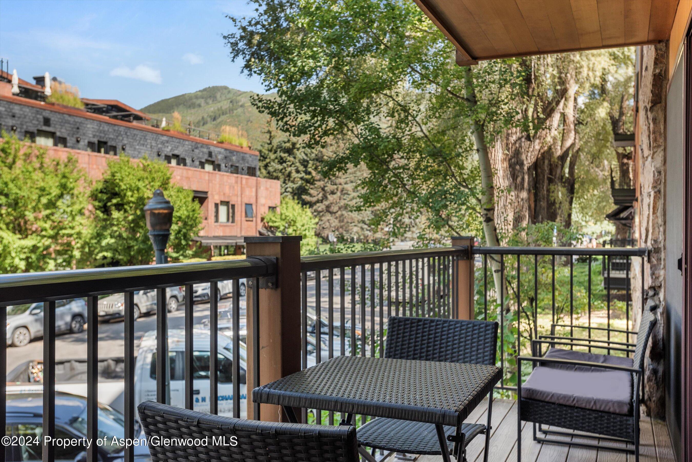 205 East Durant Avenue, Unit 1I Aspen, CO 81611 - Photo 34 of 45 a balcony view with a seating space