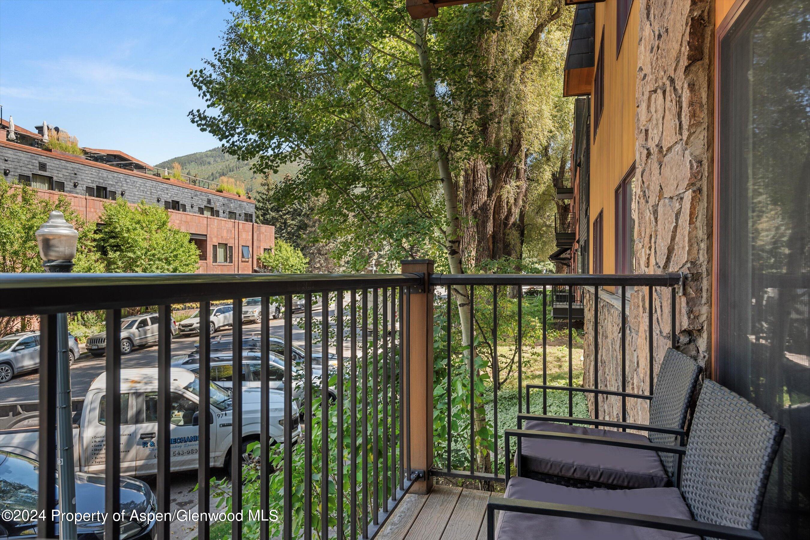 205 East Durant Avenue, Unit 1I Aspen, CO 81611 - Photo 38 of 45 a view of a balcony with furniture