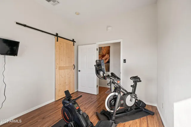 a view of a chairs and table in a patio