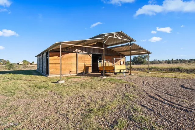 a view of a terrace with beach and ocean view