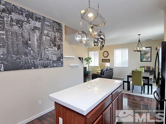 11615 Verazae Drive Reno, NV 89521 - Photo 11 of 25 a large kitchen with a table and chairs