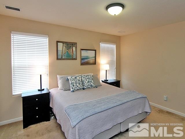 11615 Verazae Drive Reno, NV 89521 - Photo 13 of 25 a bedroom with a bed and a window