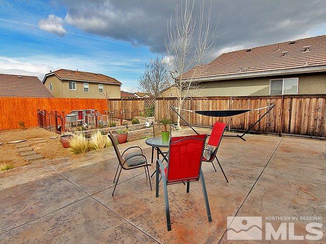 11615 Verazae Drive Reno, NV 89521 - Photo 20 of 25 a view of a chairs and table in the patio