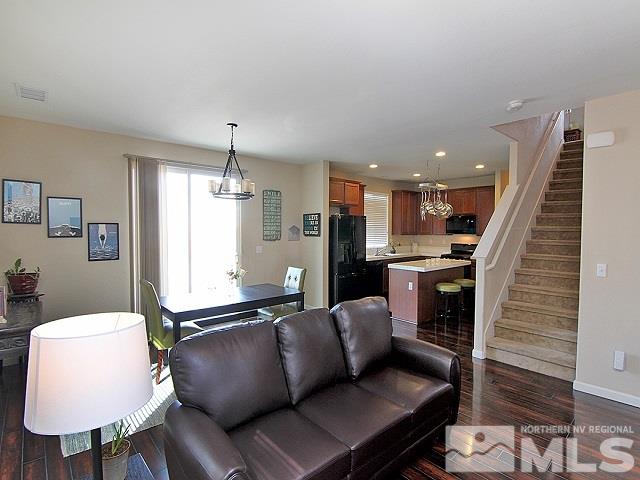 11615 Verazae Drive Reno, NV 89521 - Photo 3 of 25 a living room with furniture and kitchen view