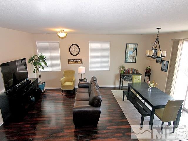 11615 Verazae Drive Reno, NV 89521 - Photo 4 of 25 a living room with furniture and wooden floor