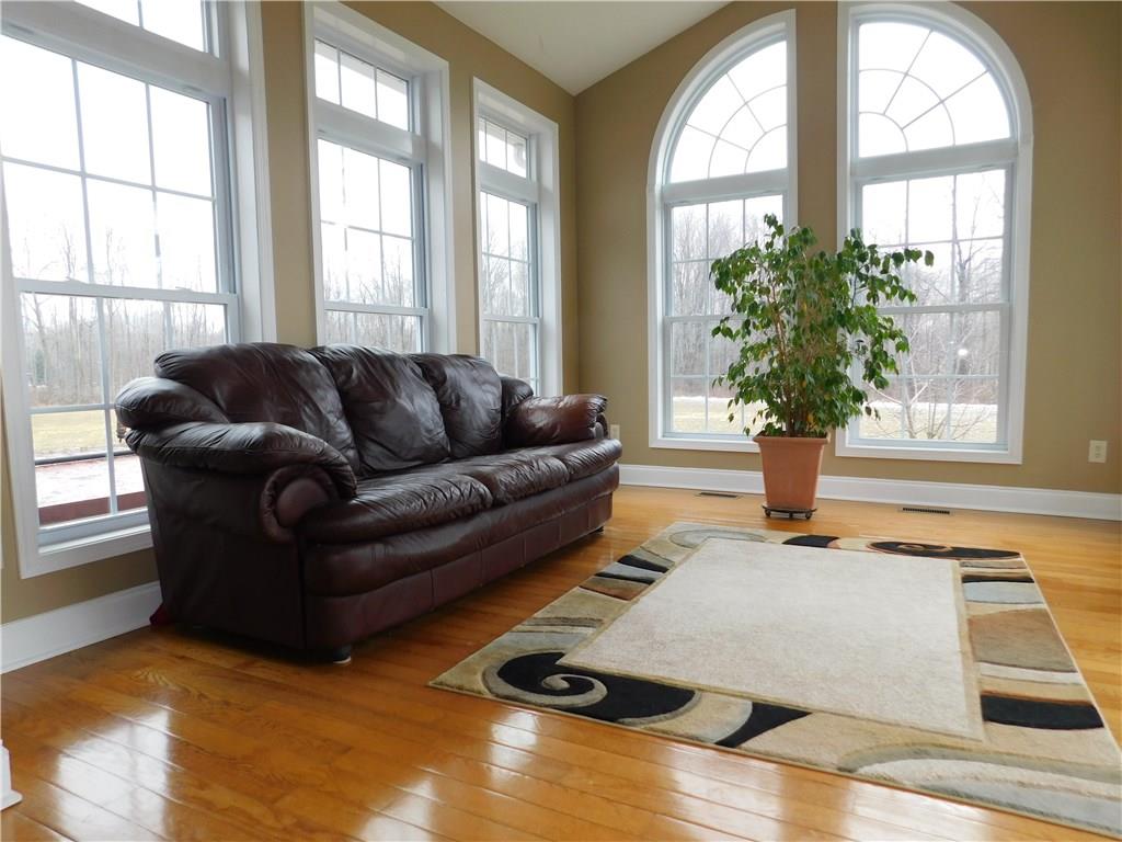 56 Flick Road Hadley, PA 16130 - Photo 12 of 25 CURRENTLY USED AS A SITTING ROOM COULD BE FORMAL D.R. OR L.R.