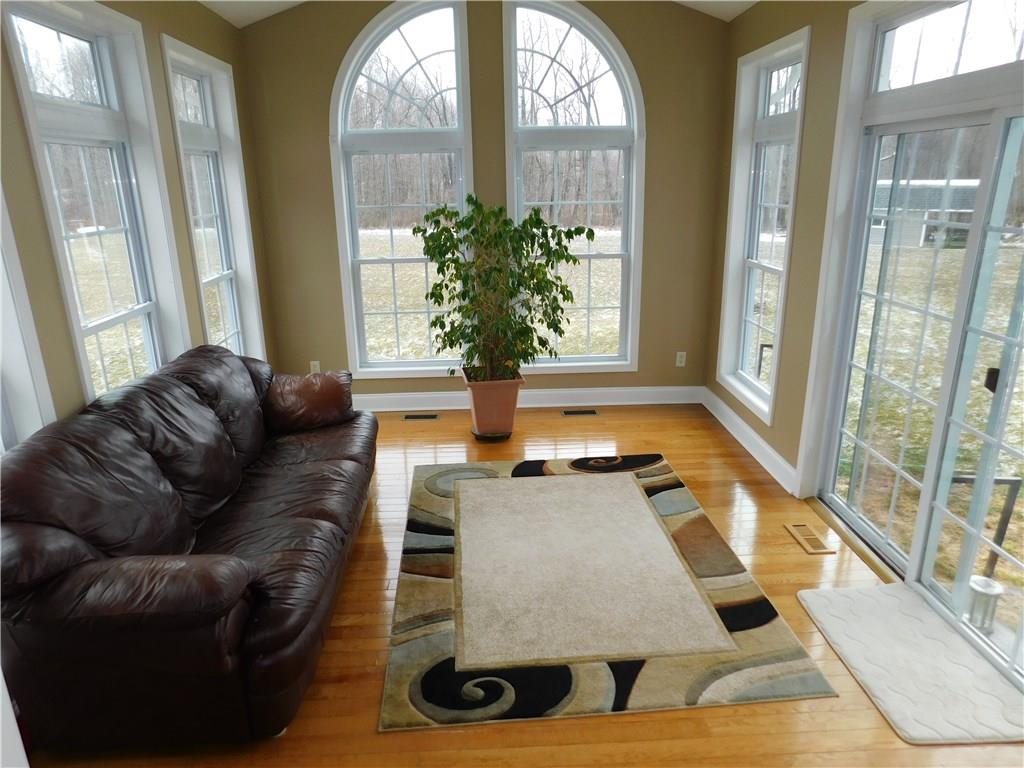 56 Flick Road Hadley, PA 16130 - Photo 13 of 25 SLIDING DOOR LEADS TO REAR YARD OFF DEN/D.R./SUN ROOM. VERY VERSATILE ROOM.