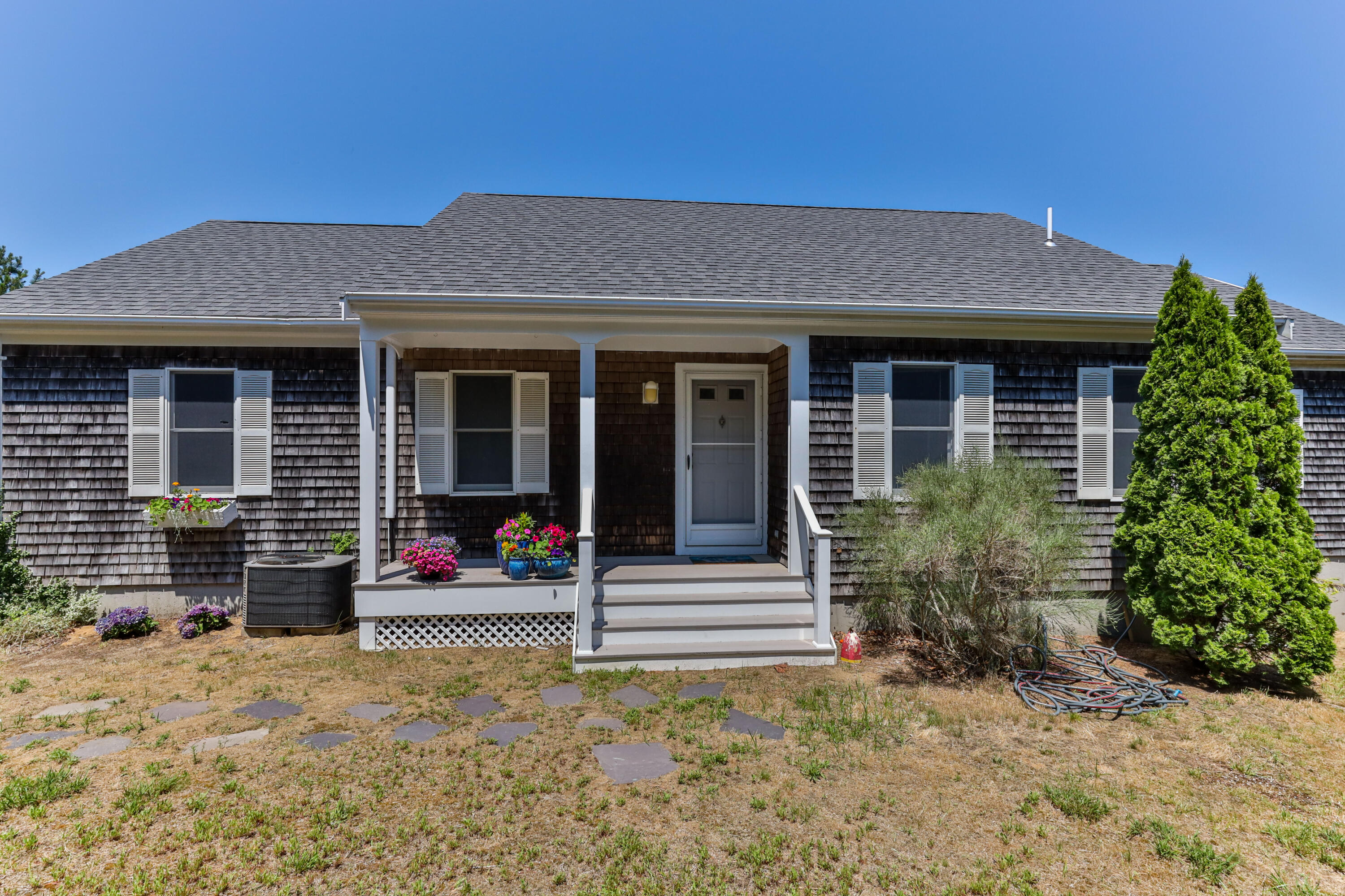 5 Starbuck Road Truro, MA 02666 - Photo 1 of 46 front view of a house with a yard