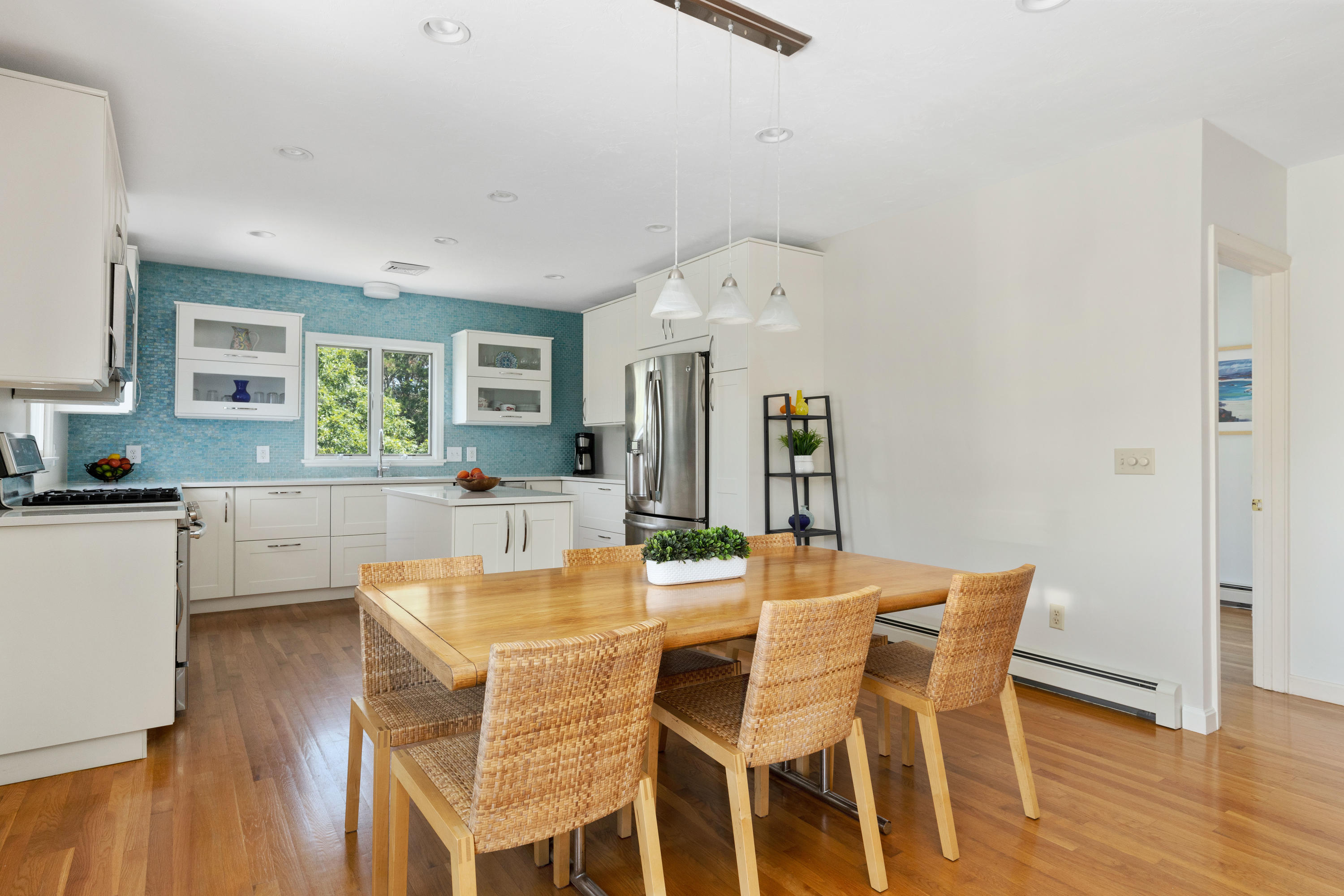 5 Starbuck Road Truro, MA 02666 - Photo 12 of 46 a view of a dining room with furniture and wooden floor